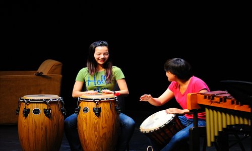 Children are invited to play musical instruments in Shanghai Concert Hall. Photos: Courtesy of the venues