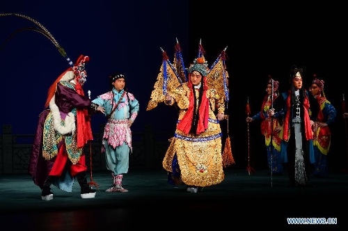 Artists perform Peking opera at the Lucent Danstheater in Hague, the Netherlands, May 21, 2013. Peking Opera Theater of Beijing started its European tour in Hague on Tuesday. It will also perform in Linz of Austria and Milan of Italy. (Xinhua/Jin Liangkuai) 