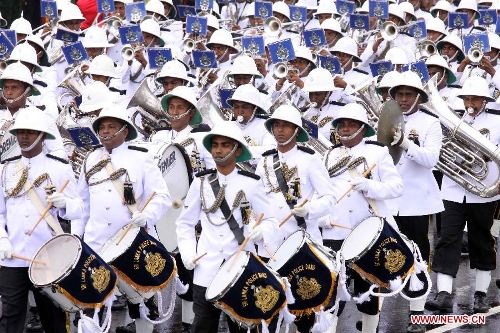 Police band participate in a military parade to celebrate Sri Lanka's 65th Independence Day in Trincomalee, Sri Lanka, Feb. 4, 2013.(Xinhua/Pushpika Karunaratne)