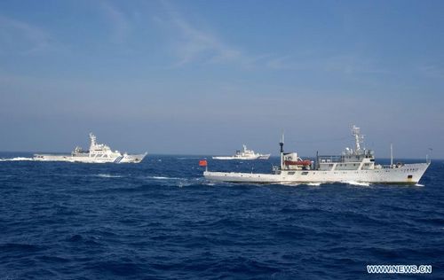 Chinese patrol ships encounter Japanese Coast Guard vessels near the Diaoyu Islands in the East China Sea, July 11, 2012. Three Chinese fishery patrol ships engaged in a verbal confrontation with Japanese Coast Guard ships during a routine patrol in waters near the Diaoyu Islands on Wednesday, fishery authorities said Thursday. Photo: Xinhua