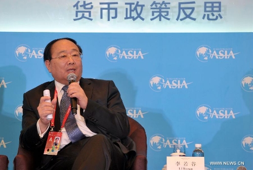 Li Ruogu, chairman and president of the Export-Import Bank of China, speaks during the sub-forum 