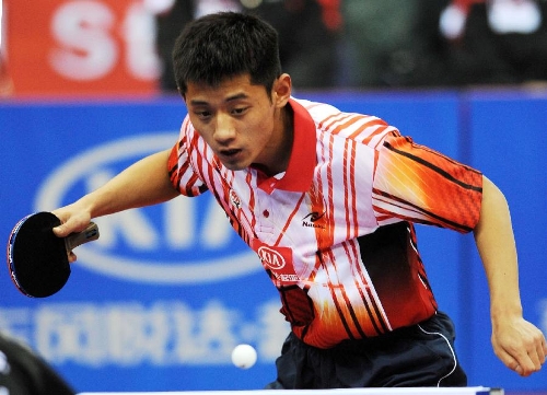 China's Zhang Jike of Team Asia returns the ball during the match against Germany' Dimitrij Ovtcharov of Team Europe at the 2013 Asia-Europe Table Tennis All Stars Challenge in Qingdao, east China's Shandong Province, March 17, 2013. Team Asia won 7-3. (Xinhua/Li Ziheng) 