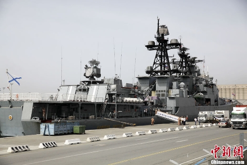Russian sailors are seen aboard the Admiral Panteleyev Russian war ship moored at the Cypriot port of Limassol on Friday, May 17, 2013. Russian naval vessels including the destroyer Admiral Panteleyev, the tanker Pechenga and the rescue tugboat Fotiy Krylov docked at Limassol as part of a four-day visit to the Mediterranean island, Russia's defense ministry said in a statement. The vessels, which are attached to Russia's Pacific fleet, arrived in the Mediterranean sea in recent days as Russia maintains a strong presence in the eastern Mediterranean, especially in light of the civil war now engulfing Syria where Moscow has a key naval base. (Photo Source: chinanews.com)