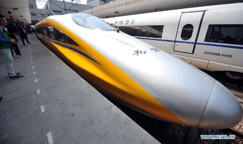 A bullet train is ready for a test run of the Nanjing-Hangzhou High-Speed Railway from Hangzhou East Railway Station in Hangzhou, capital of east China's Zhejiang Province, March 28, 2013. The new Nanjing-Hangzhou High-Speed Railway is a supplement to railway travelling within China's Yangtze River Delta. The 249-kilometer rail line will reduce travel time from Nanjing to Hangzhou to about an hour. (Xinhua/Wang Dingchang) 