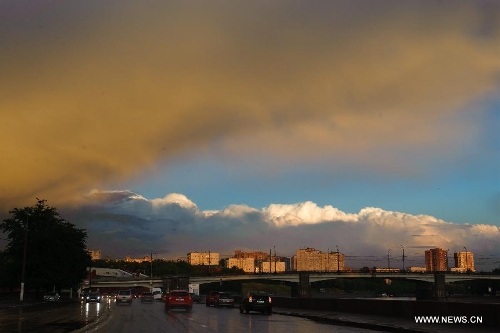 Photo taken on May 22, 2013 shows a view of Moscow city after a heavy rain in late afternoon. (Xinhua/Jiang Kehong)