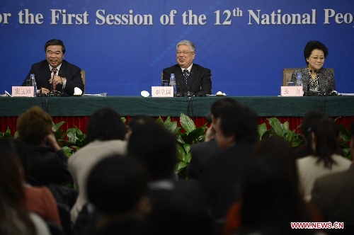 Minister of Civil Affairs Li Liguo (C) and Vice Ministers Jiang Li (R) and Dou Yupei attend a news conference on people's livelihood and social service held by the first session of the 12th National People's Congress (NPC) in Beijing, capital of China, March 13, 2013. (Xinhua/Wang Peng)
