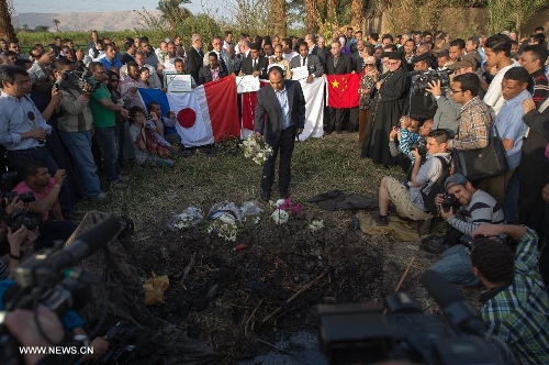  A man presents flower to the victims in the balloon explosion in Luxor, Egypt, on March 1, 2013. Luxor governorate held a mourning ceremony here for the victims of the explosion.(Xinhua/Li Muzi)Related:Egypt's Luxor balloon tours may reopen in one week: governorLUXOR, Egypt, March 1 (Xinhua) -- The hot air balloon tours may reopen for tourists in a week, as the legal papers and permits of balloon companies are valid and they undergo regular technical check, Luxor Governor Ezzat Saad told Xinhua in an exclusive interview Friday.The governor's statement comes a few days after a shocking hot balloon explosion in Egypt's famous city of antiquities Luxor, some 670 km south of the capital Cairo, which killed 21 tourists with different nationalities and injured the other two.  Full story