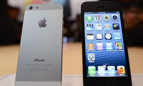 The new iPhone 5 is displayed during an Apple special event in San Francisco, the United States, September 12, 2012. Apple on Wednesday unveiled iPhone 5, its latest generation of smartphone that features bigger display and support for faster LTE wireless network. Photo: Xinhua