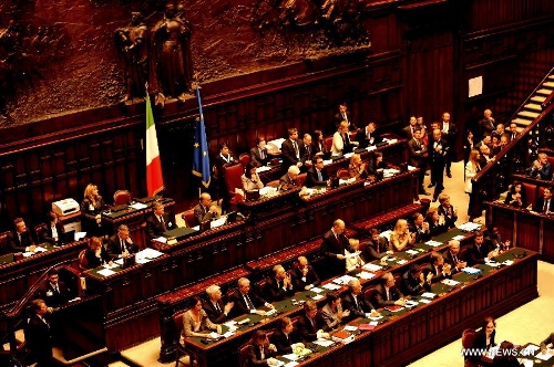 Italian Prime Minister Enrico Letta addresses the parliament in Rome, April 29, 2013. The new prime minister hopes to tackle unemployment figures at close to 12 percent which is higher among the young and move away from austerity imposed by his predecessor Mario Monti. (Xinhua/Xu Nizhi) 