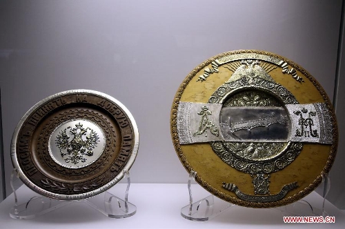 Photo taken on Feb. 6, 2013 shows craftworks presented on the exhibition of 