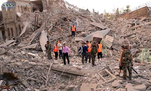 A handout photo provided by Syria's Arab News Agency SANA shows destruction and huge damages caused by the three explosions that had rattled Saadallah al-Jabiri Square in the northern city of Aleppo, Syria, on Oct. 3, 2012. According to media reports, three suicide car bombs exploded simultaneously in the area, killing at least 30 people. Photo: Xinhua