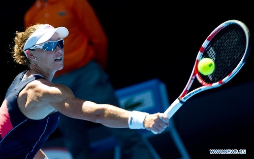 Samantha Stosur of Australia hits a return during her first round women's singles match against Chang Kai-Chen of Chinese Taipei on the first day of 2013 Australian Open tennis tournament in Melbourne, Australia, Jan. 14, 2013. Samantha Stosur won 2-0 to enter the next round. (Xinhua/Bai Xue) 