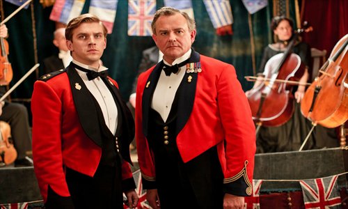 The ladies and gentlemen of Downton Abbey, including Robert, Earl of Grantham, pictured to the right in his red coat Photos: CFP