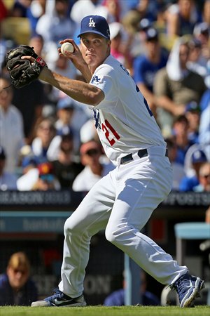 Los Angeles Dodgers pitcher Zack Greinke throws in the second inning during game five of the National League Championship Series against the St. Louis Cardinals on Wednesday in Los Angeles. Photo: IC