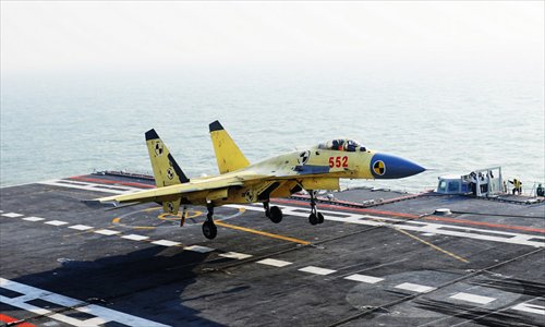 Photo shows carrier-borne J-15 fighter jet lands on China's first aircraft carrier, the Liaoning.  Photo: mil. cnr.cn