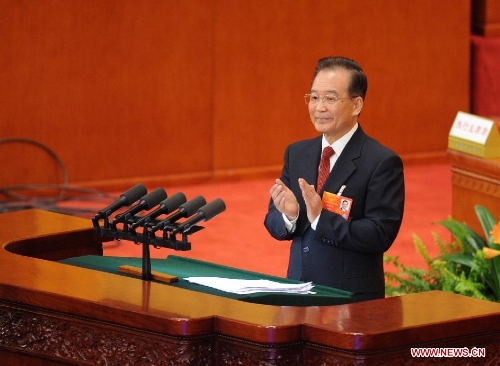 Chinese Premier Wen Jiabao delivers the government work report during the opening meeting of the first session of the 12th National People's Congress (NPC) at the Great Hall of the People in Beijing, capital of China, March 5, 2013. (Xinhua/Xie Huanchi)