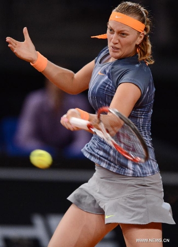 Petra Kvitova of the Czech Republic returns the ball during the first round match of Porsche Tennis Grand Prix against Annika Beck of Germany in Stuttgart, Germany, on April 24, 2013. Petra Kvitova won 2-1. (Xinhua/Ma Ning) 