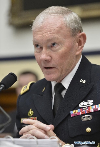 U.S. Chairman of Joint Chiefs of Staff General Martin Dempsey testifies before the House Armed Services Committee during a hearing on the fiscal year 2014 national defense authorization budget request from the Department of Defense, on Capitol Hill in Washington D.C., capital of the United States, April 11, 2013. U.S. President Barack Obama on Wednesday proposed a 526.6-billion-dollar base budget for the Defense Department in fiscal year 2014, as the Pentagon struggles to provide funds for its strategic rebalance to the Asia Pacific amid mandatory budget cuts. (Xinhua/Zhang Jun) 