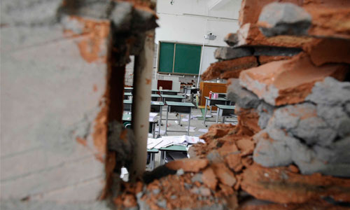 The Ya'an earthquake ripped large holes in the wall of this Lushan Middle School classroom on April 20. Photo: Li Hao/GT