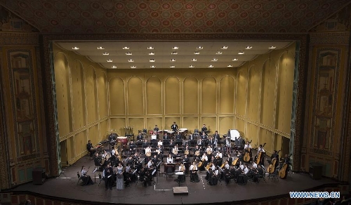 Members of the China Central Chinese Orchestra perform during a Spring Festival celebration concert in Pasadena, Los Angeles, the United States, Feb. 4, 2013. (Xinhua/Yang Lei) 