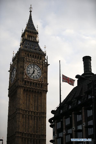 The Union Flag flies at half mast over Portcullis House following the death of former British Prime Minister Baroness Margaret Thatcher in London, Britain, on April 8, 2013. It has been confirmed that Lady Thatcher died this morning following a stroke at the age of 87. (Xinhua/Wang Lili) 