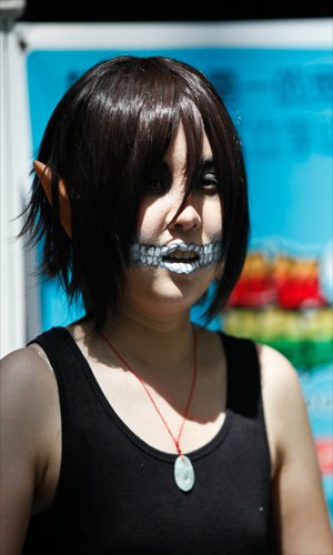 A young woman dresses as her favorite comic character to play her part in the 9th China International Comics Games Expo in Shanghai.Photo: Cai Xianmin/GT