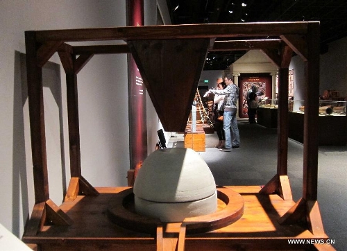  A grinding machine of ancient Rome is seen during an exhibition at Hong Kong Science Museum in south China's Hong Kong, Jan. 23, 2013. Exhibition 