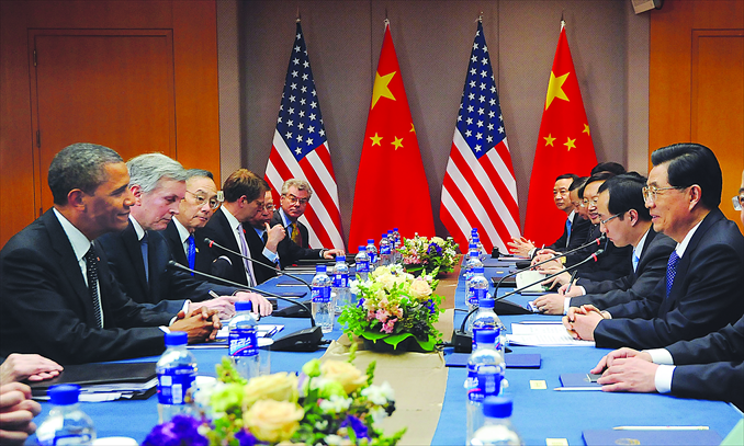 President Hu Jintao and US President Barack Obama hold a bilateral meeting yesterday on the sidelines of the 2012 Seoul Nuclear Security Summit. Photo: AFP