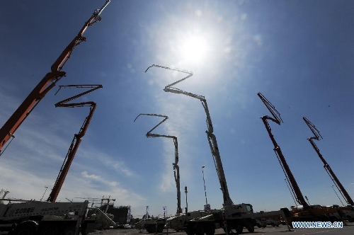 Pump trucks are seen at the 2013 China (Shenyang) International Architecture Exposition in Shenyang, capital of northeast China's Liaoning Province, May 20, 2013. The three-day expo kicked off on Monday, with 615 enterprises from home and abroad participated. (Xinhua/Yang Qing)