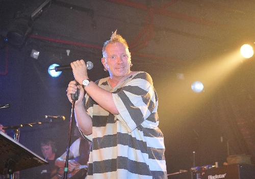 British singer John Lydon performs with his band Public Image Limited (PiL) at a live show in Beijing, capital of China, March 30, 2013. The performance was the band's first show in China led by John Lydon, better known as Johnny Rotten from his days as lead singer in the British punk band Sex Pistols. (Xinhua/Xiao Xiao) 