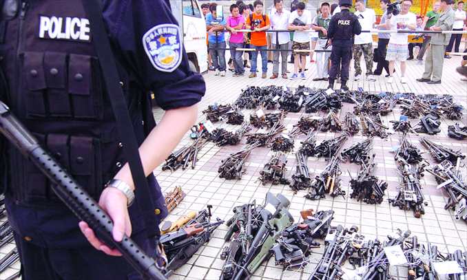 Illegal firearms are displayed before being destroyed by police in Hangzhou, Zhejiang Province, on June 12. Photo: CFP