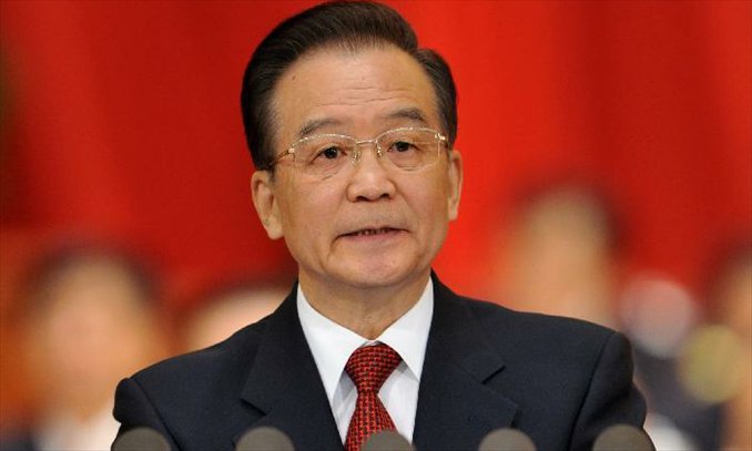 Chinese Premier Wen Jiabao delivers the government work report during the opening meeting of the first session of the 12th National People's Congress (NPC) at the Great Hall of the People in Beijing, capital of China, March 5, 2013. (Xinhua/Huang Jingwen) 