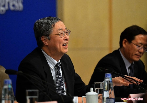 Zhou Xiaochuan, China's central bank governor, speaks at a news conference on China's currency policy and financial reform held by the first session of the 12th National People's Congress (NPC) in Beijing, capital of China, March 13, 2013. (Xinhua/Wang Song)