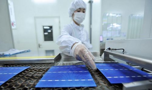 A staff worker sorts photovoltaic products at a solar energy company in Hangzhou, capital of East China's Zhejiang Province, May 24, 2012. European Commission filed an antidumping investigation over Chinese photovoltaic (PV) products Thursday. The case is the largest trade dispute involving China in terms of trade volume, as the country's solar product exports were valued at $35.8 billion in 2011, with the EU receiving a share of more than 60 percent, or $20.4 billion. Photo: Xinhua