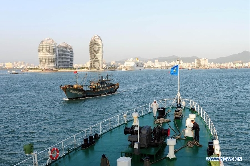 Patrol vessel Haixun 21 arrives at a port in Sanya, south China's Hainan Province, Jan. 17, 2013, after finishing a three-day patrol in the South China Sea. (Xinhua/Hou Jiansen) 