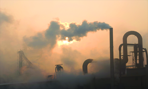 A cement mill discharges waste gas in Binzhou, East China's Shandong Province . Photo: CFP