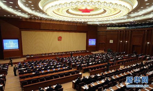 The third plenary meeting of the 30th session of the 11th National People's Congress (NPC) Standing Committee closed at the Great Hall of the People in Beijing, capital of China, December 28, 2012.