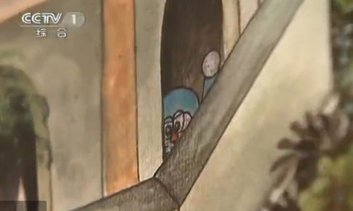 Japanese cartoon character Doraemon appears in murals at the Wat Sampa Siw temple, Thailand. Photos: screen shot of CCTV