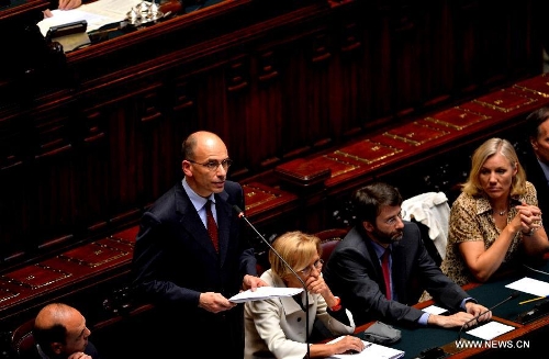 Italian Prime Minister Enrico Letta addresses the parliament in Rome, April 29, 2013. The new prime minister hopes to tackle unemployment figures at close to 12 percent which is higher among the young and move away from austerity imposed by his predecessor Mario Monti. (Xinhua/Xu Nizhi) 
