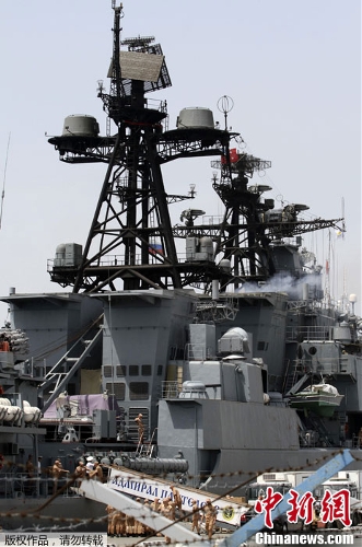 Russian sailors are seen aboad the Admiral Panteleyev Russian war ship moored at the Cypriot port of Limassol on Friday, May 17, 2013. (Photo Source: chinanews.com)