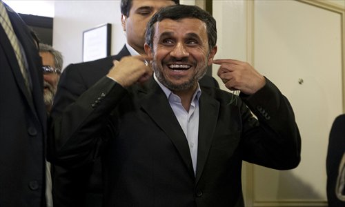 Iran's President Mahmoud Ahmadinejad gestures as he leaves a news conference on Wednesday in New York. Photo: AFP 
