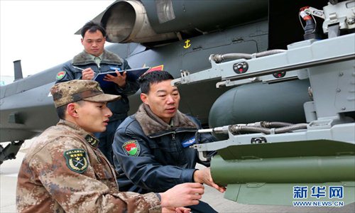 An army aviation brigade under the Nanjing Military Area Command (MAC) of the Chinese People's Liberation Army (PLA) organizes a helicopter flight training, in a bid to temper the tactical skills of the pilots and the helicopter operation-and-control capability. (Xinhua/Guo Weihu)
