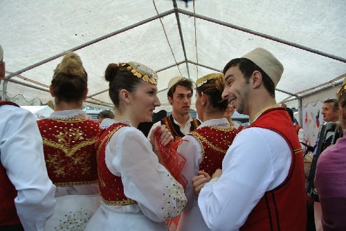 Albanians celebrate the Summer Festival in Tirana, capital of Albania on March 14, 2013. The festival is celebrated to mark the end of winter, the rebirth of nature and a rejuvenation of spirit amongst the Albanians. Although the epicentre of this festival is in Elbasan, the festival is widely celebrated in Tirana and other cities across Albania. (Xinhua/Liu Lihang)