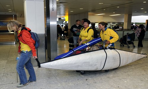 The youngest member of the Australian Olympic team, canoeist Jessie Foxaged, 18, arrives at Heathrow Airport, London, on July 17. Photo: IC