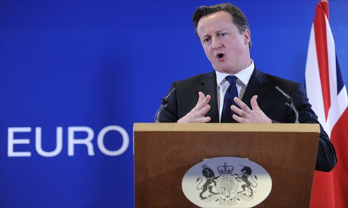 British Prime Minister David Cameron speaks during a press conference at the EU Headquarters on December 14, 2012 in Brussels. Photo: AFP 