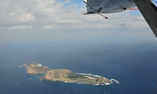 Photo taken on a marine surveillance plane B-3837 on Dec. 13, 2012 shows the Diaoyu Islands and nearby islands. A Chinese marine surveillance plane was sent to join vessels patrolling the territorial waters around the Diaoyu Islands on Thursday morning, according to China's maritime authorities. Photo: Xinhua