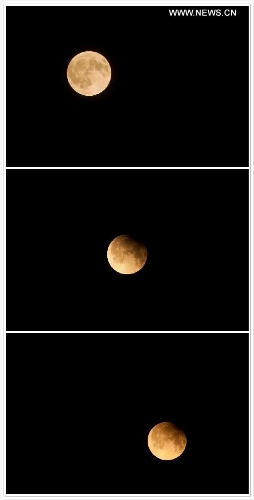 Combination photo taken on April 26, 2013 shows a partial lunar eclipse over the sky of Beijing, capital of China. The earth casts a shadow on the face of the moon and makes the partial lunar eclipse. (Xinhua/Zhang Cheng) 