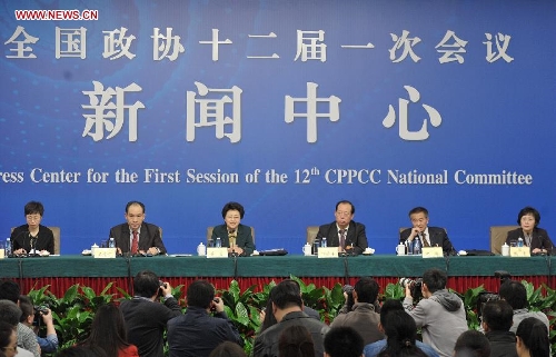 Members of the 12th National Committee of the Chinese People's Political Consultative Conference (CPPCC) (from 2nd L to 1st R) Wu Xianning, Jiang Li, Bian Jinping, Shao Hong and Zhen Zhen are invited to a press conference held by the first session of the 12th CPPCC National Committee in Beijing, capital of China, March 8, 2013. They answered questions on improvements in political consultative system. (Xinhua/Guo Chen)