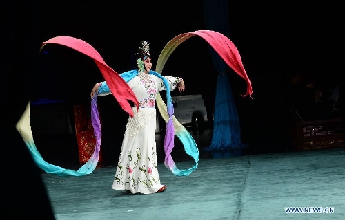 An artist performs Peking opera at the Lucent Danstheater in Hague, the Netherlands, May 21, 2013. Peking Opera Theater of Beijing started its European tour in Hague on Tuesday. It will also perform in Linz of Austria and Milan of Italy. (Xinhua/Jin Liangkuai) 