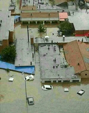 Houses are submerged in Erdos in the Inner Mongolia Autonomous Region following a severe rain and hailstorm on Monday. Photo: CFP